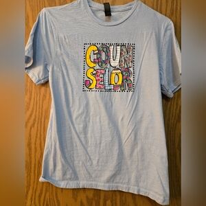 Very cute light blue short sleeve t shirt. Size small. Great condition.